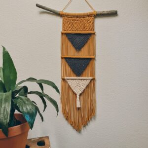 Home Decor Macrame Magic: Macrame is BACK, baby! This groovy craft is surprisingly easy to learn, and you can create stunning wall hangings, plant holders, or even boho cushion covers. There are tons of online tutorials to get you started, so unleash your inner hippie and get knotty! ✌️