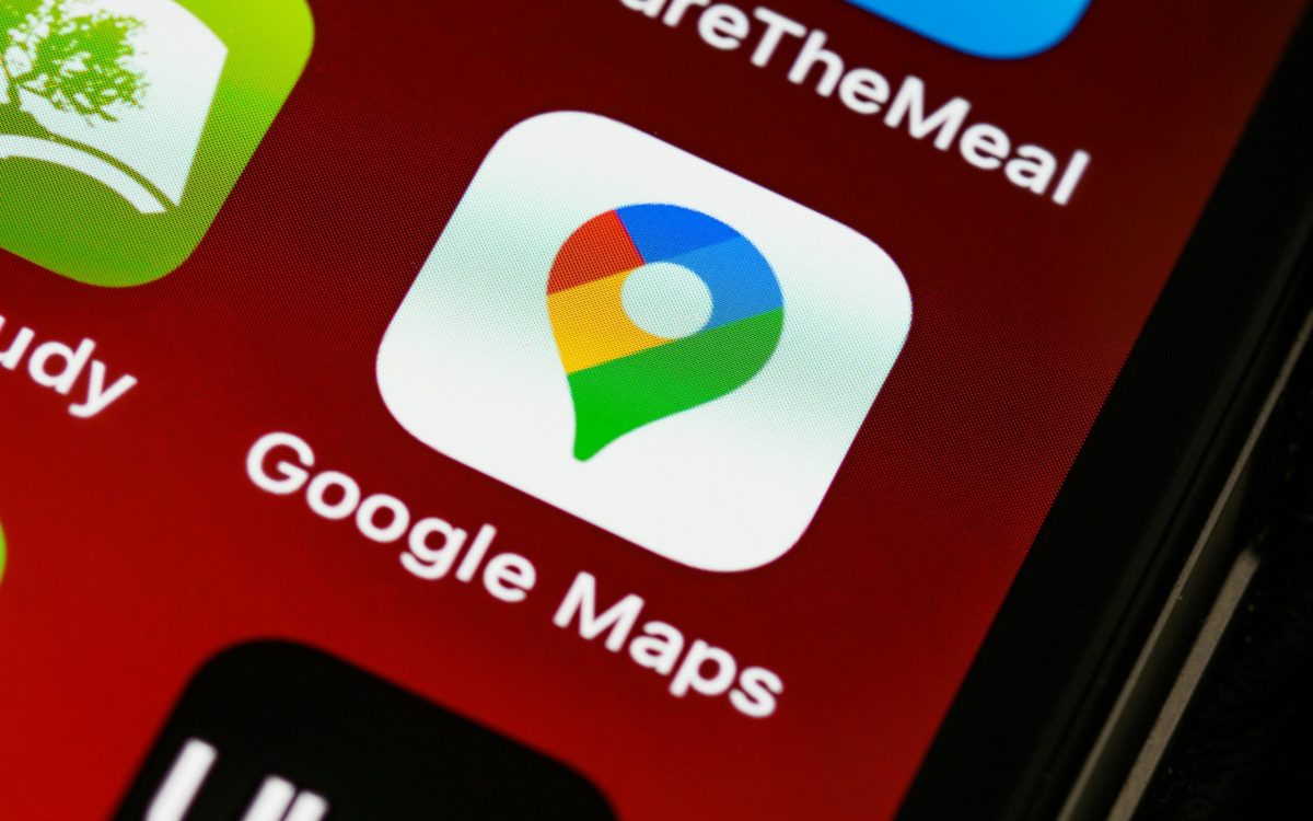 UpSwap app on phone screen showing a map with local business icons